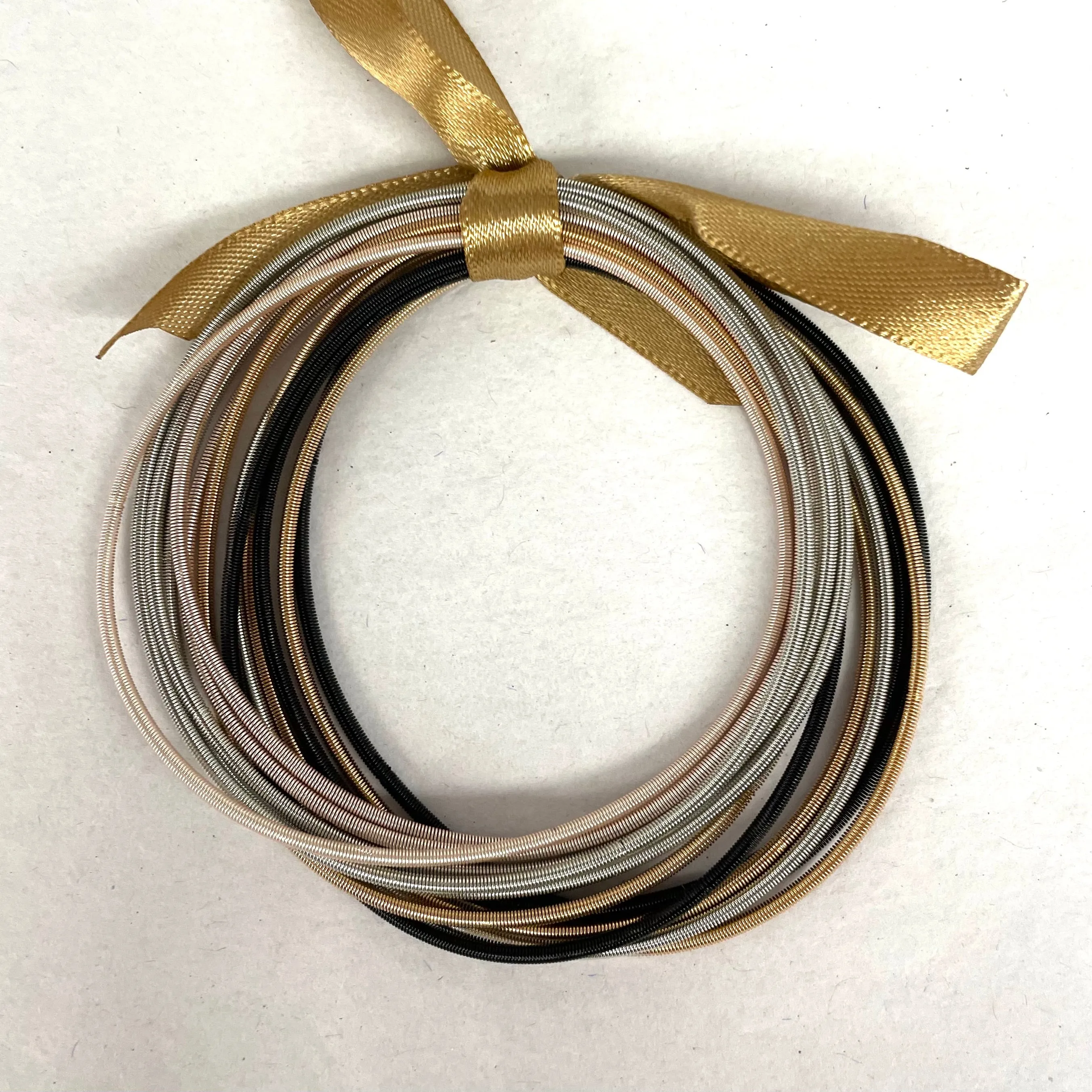 Set of 12 Piano Wire Bracelets