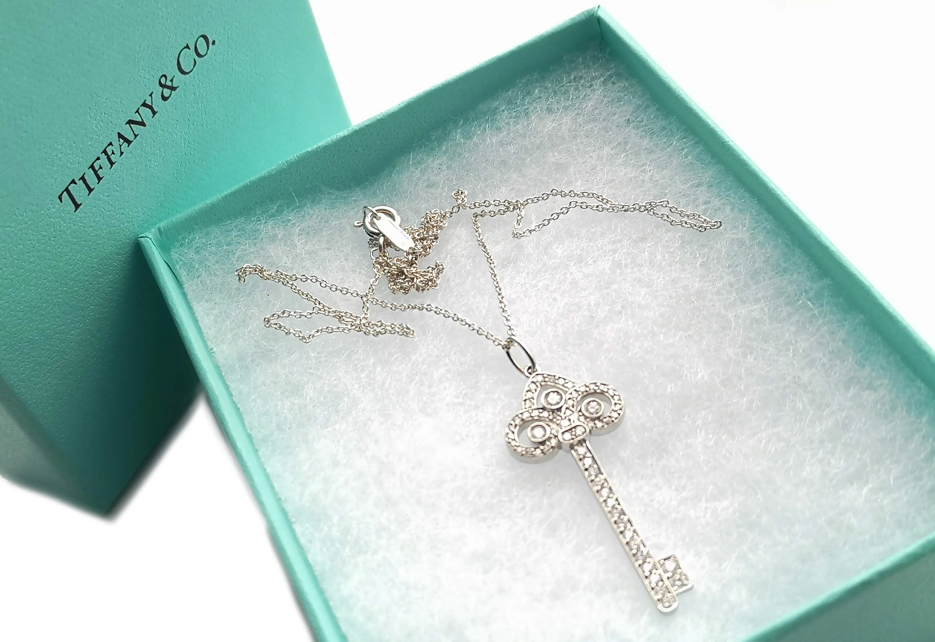 Tiffany & Co. Fleur de Lis Diamond Key Pendant, 18 inch chain