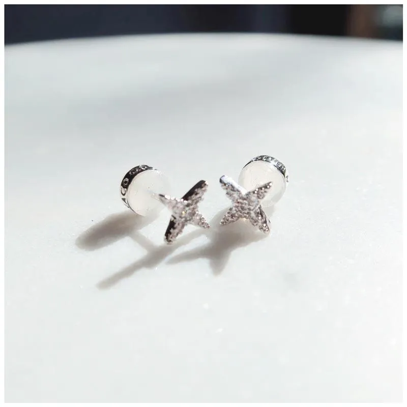 Tiny Star Studs - Silver